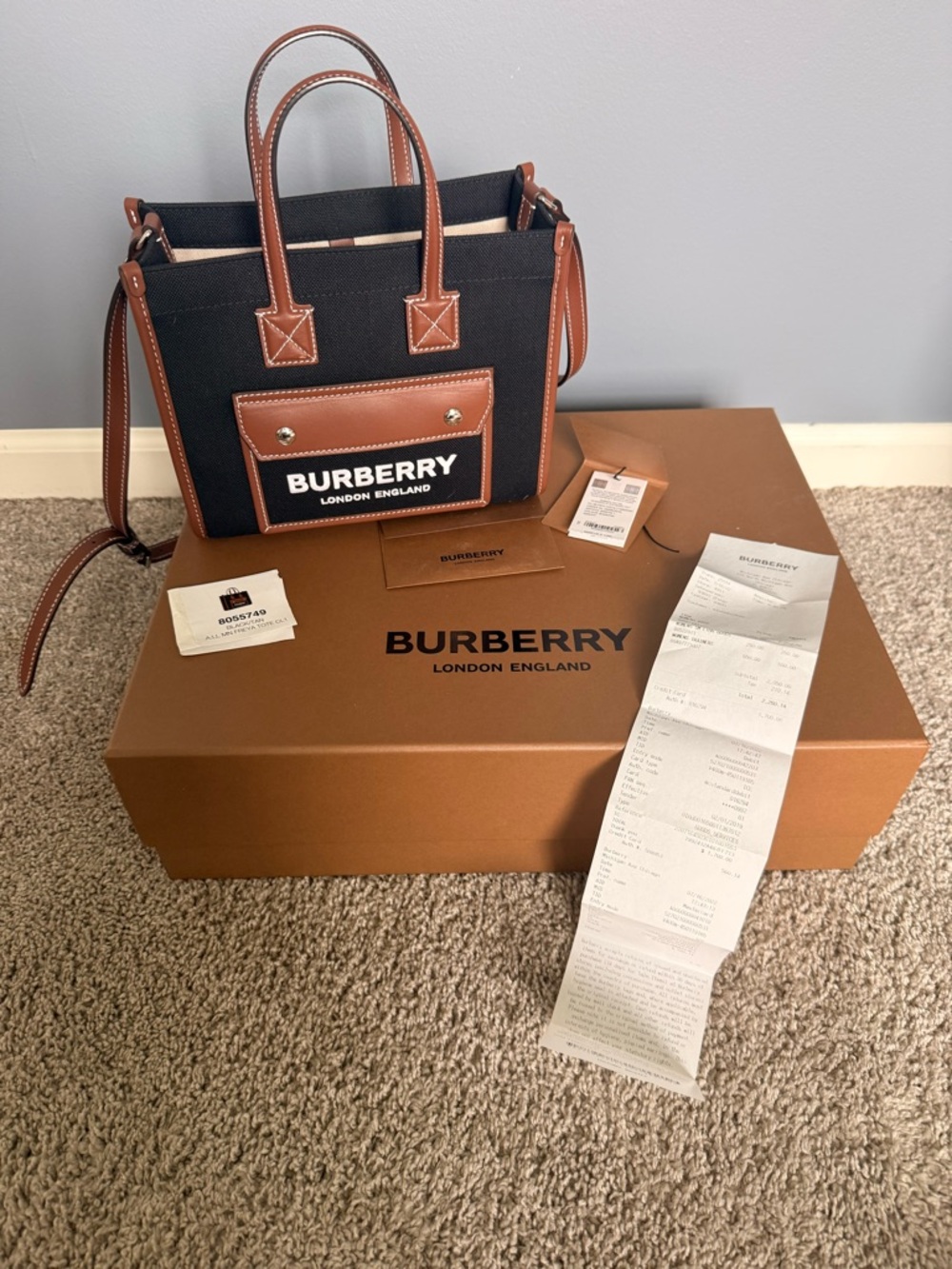 Excellent Condition!

Burberry 
Freya Mini Black Canvas & Brown Leather Tote